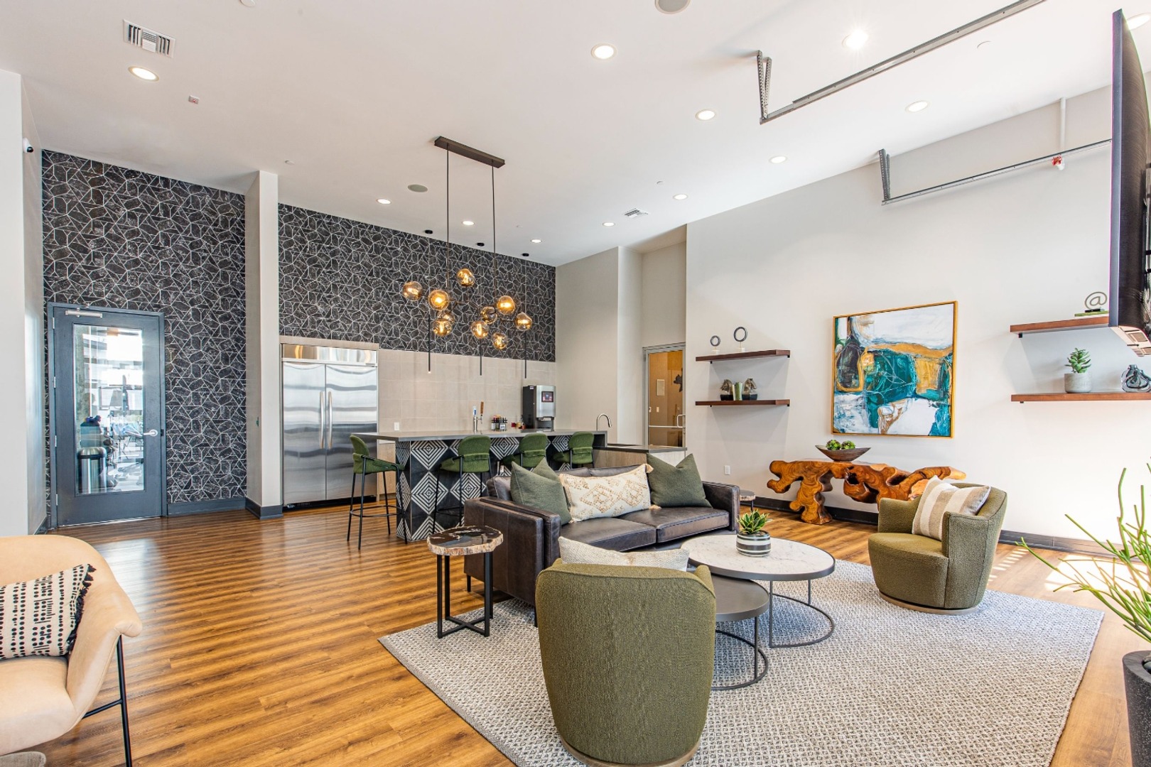 Clubhouse seating area with community kitchen in Denver, Colorado.