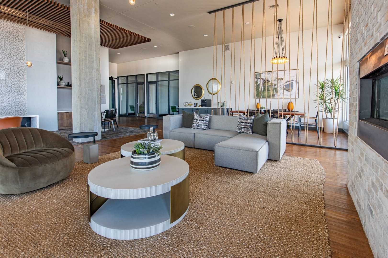 Modern clubhouse lounge with couches and coffee tables