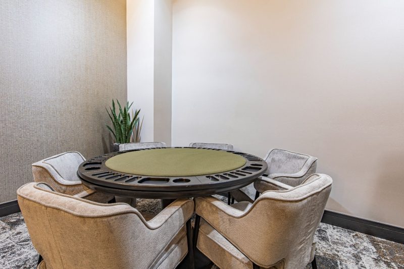 Clubhouse poker table with seating for card games